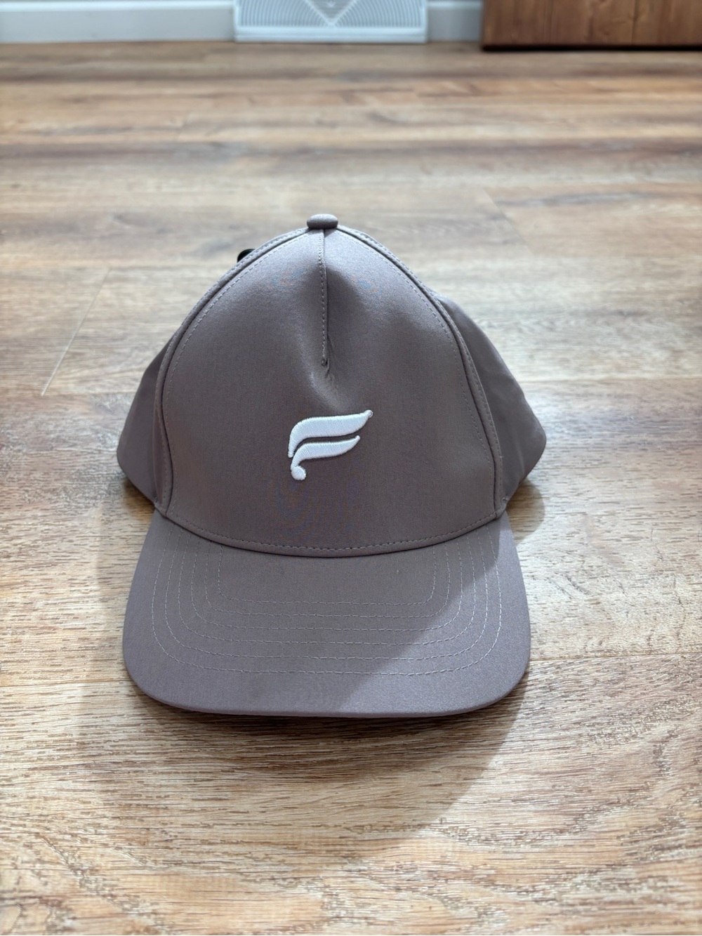 Fabletics Taupe Baseball Cap with White Wing Logo